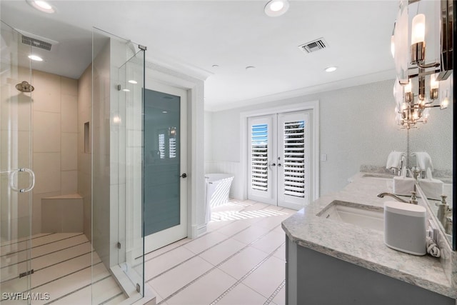 bathroom featuring vanity, french doors, tile patterned flooring, separate shower and tub, and ornamental molding