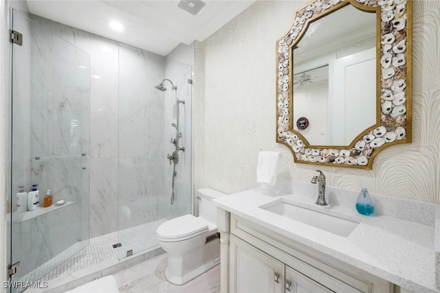 bathroom featuring walk in shower, crown molding, vanity, and toilet