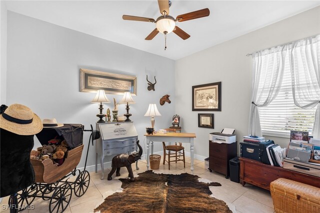 tiled home office with ceiling fan