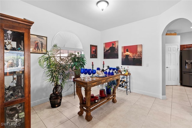 home office featuring light tile patterned floors