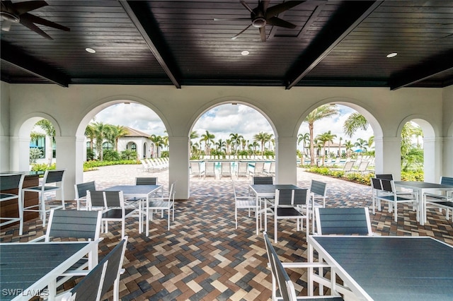 view of patio / terrace featuring ceiling fan and a community pool