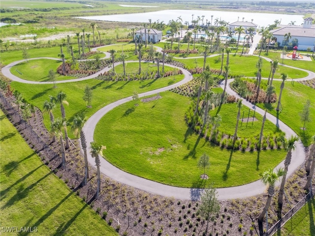 birds eye view of property with a water view