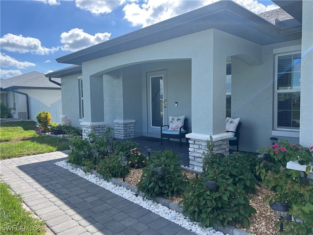 entrance to property with covered porch