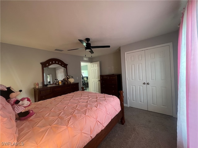 carpeted bedroom featuring ceiling fan and a closet