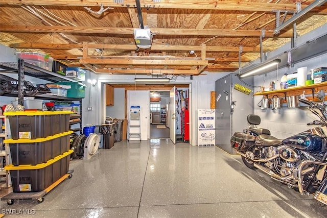 garage featuring a garage door opener