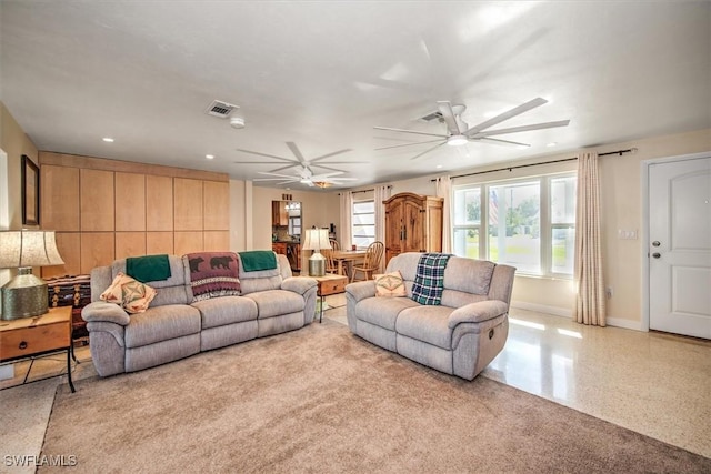 living room featuring ceiling fan