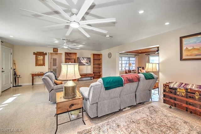 living room featuring ceiling fan