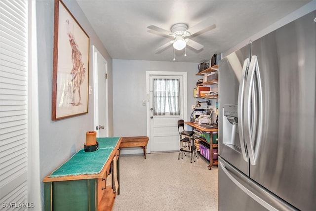 kitchen with ceiling fan, green cabinets, and stainless steel fridge with ice dispenser