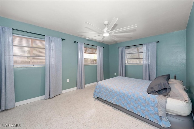 349 Coral Dr, Fort Myers, FL 33905 - bedroom featuring ceiling fan, baseboards, and speckled floor