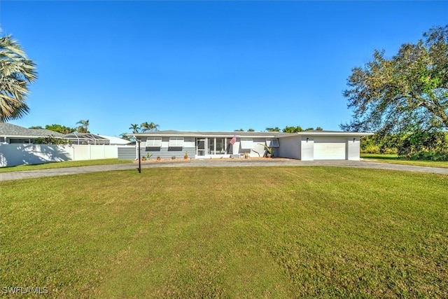 349 Coral Dr, Fort Myers, FL 33905 - ranch-style house with an attached garage and concrete driveway