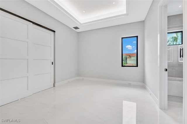 interior space featuring a tray ceiling