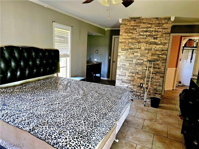 bedroom featuring crown molding and ceiling fan