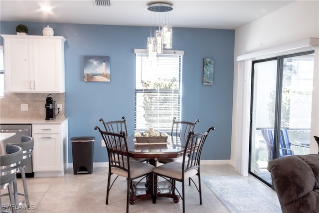 dining room with light tile patterned floors