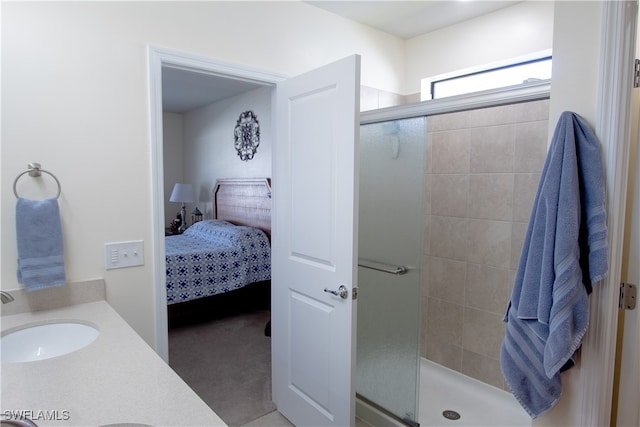 bathroom with sink and an enclosed shower