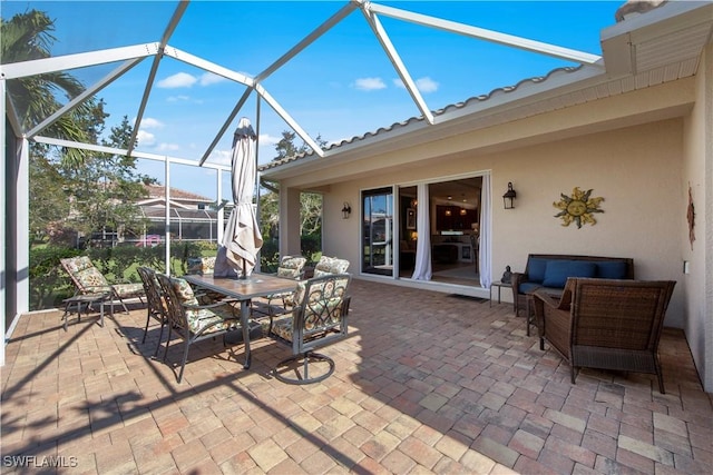 19550 Casa Bendita Ct, Estero, FL 33967 - view of patio / terrace featuring a lanai and outdoor lounge area