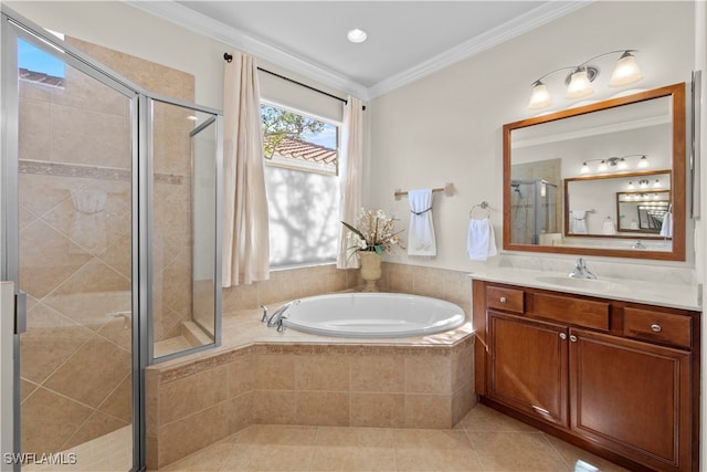 bathroom with tile patterned floors, ornamental molding, shower with separate bathtub, and vanity