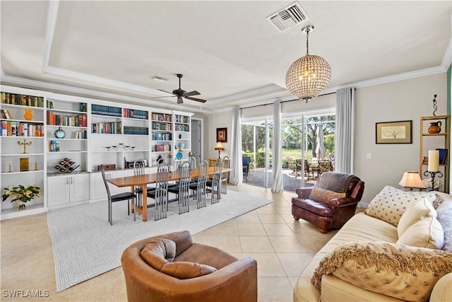 19550 Casa Bendita Ct, Estero, FL 33967 - living room featuring a raised ceiling, light tile patterned floors, ornamental molding, and a ceiling fan