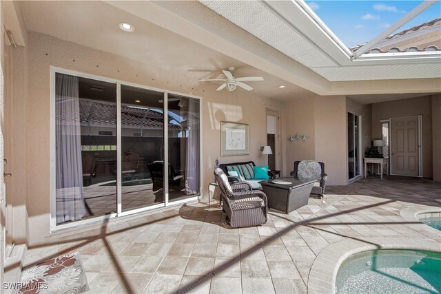 19550 Casa Bendita Ct, Estero, FL 33967 - view of patio / terrace featuring outdoor lounge area, ceiling fan, and an outdoor pool