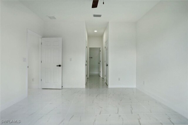 spare room featuring ceiling fan