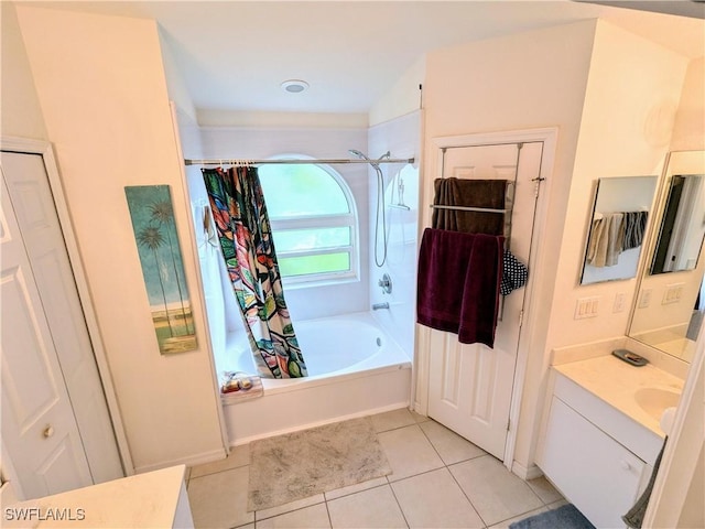 bathroom featuring tile patterned floors, vanity, and shower / tub combo