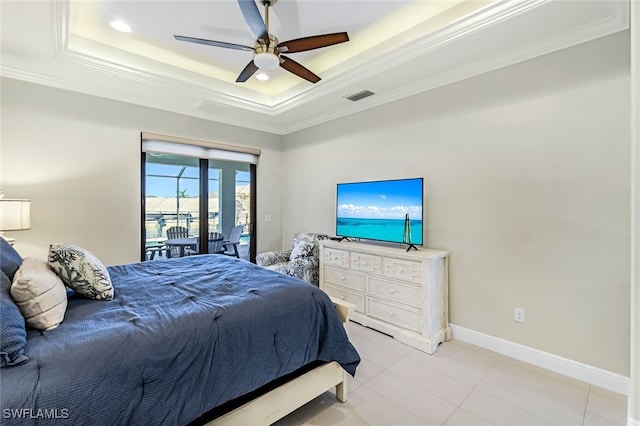 bedroom with ceiling fan, crown molding, access to outside, and a tray ceiling