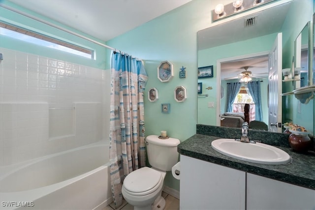 full bathroom with shower / tub combo, vanity, toilet, and ceiling fan