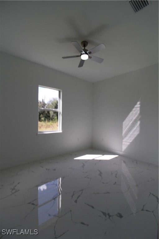 unfurnished room featuring ceiling fan