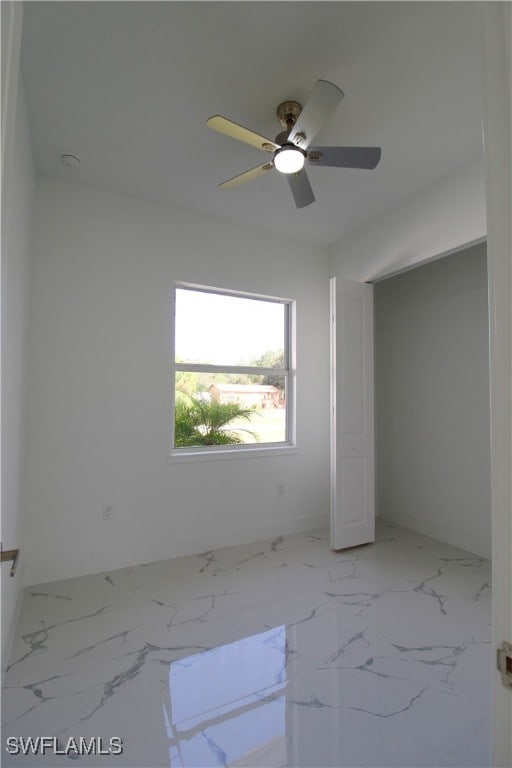 empty room with ceiling fan