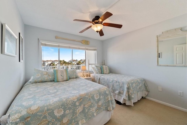 bedroom featuring carpet flooring and ceiling fan