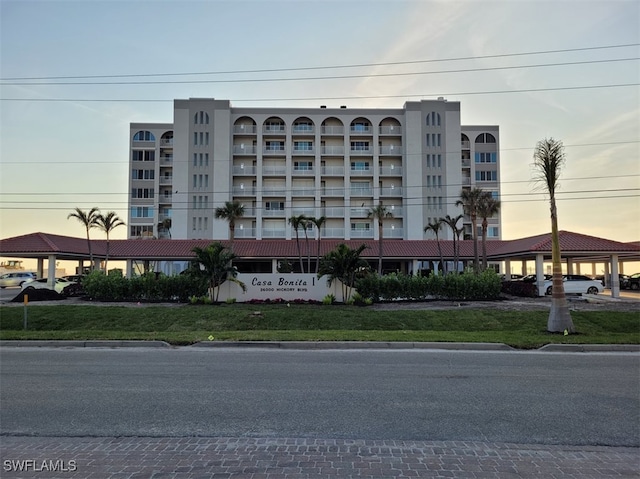 view of outdoor building at dusk