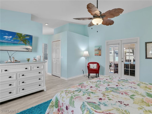 bedroom with french doors, light hardwood / wood-style flooring, ceiling fan, access to exterior, and a closet