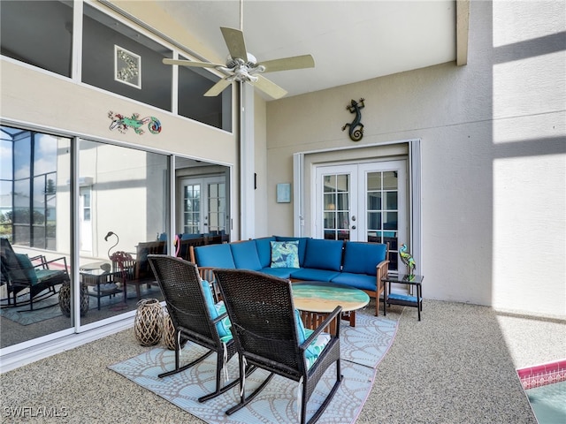 view of patio / terrace with an outdoor living space, french doors, and ceiling fan