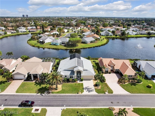 drone / aerial view featuring a water view