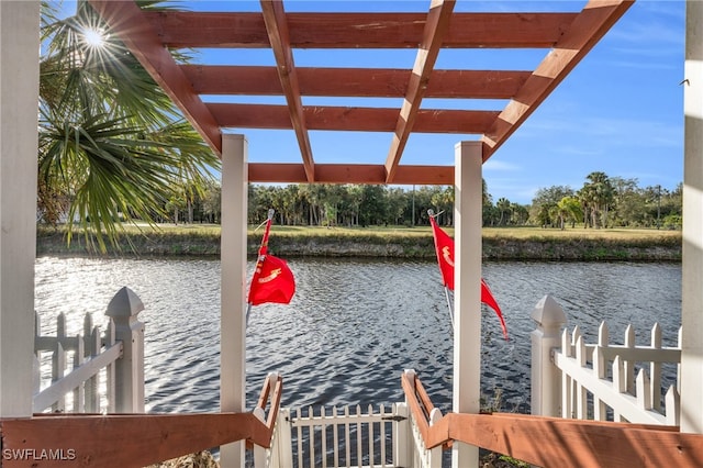 dock area with a water view