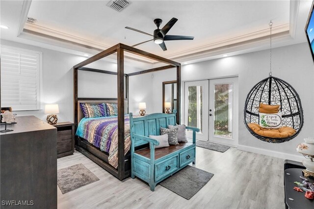 3930 24th Ave SE, Naples, FL 34117 - bedroom featuring a raised ceiling, crown molding, access to exterior, light wood-style floors, and recessed lighting