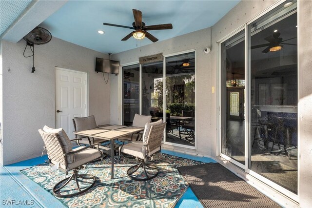 3930 24th Ave SE, Naples, FL 34117 - view of patio with a ceiling fan and outdoor dining area