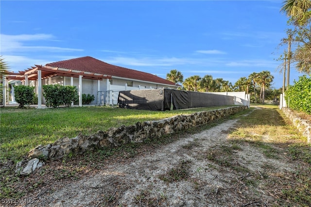 view of home's exterior featuring a lawn