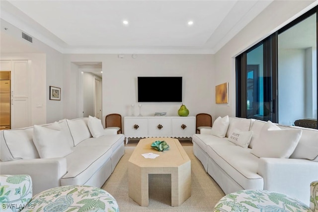 living room with crown molding