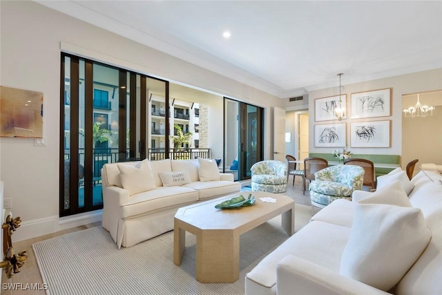 living room featuring a chandelier