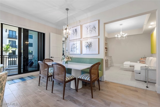 dining space featuring an inviting chandelier