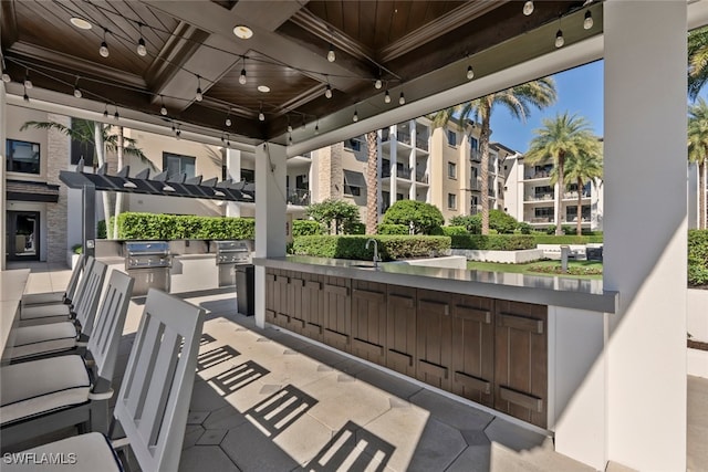 view of patio / terrace with a gazebo, area for grilling, and a grill