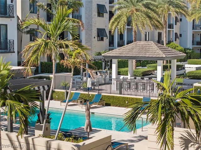 view of pool featuring a gazebo and a patio area