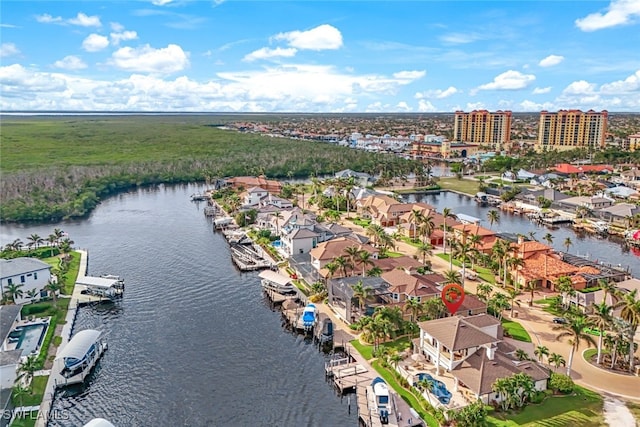 drone / aerial view with a water view