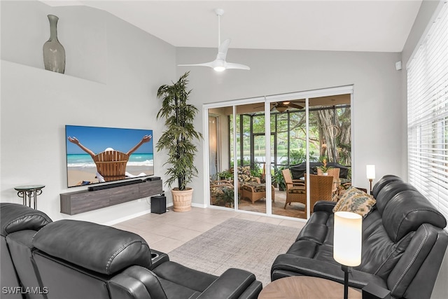 tiled living room featuring high vaulted ceiling, plenty of natural light, and ceiling fan