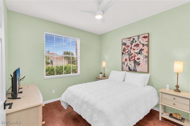 bedroom featuring hardwood / wood-style flooring and ceiling fan