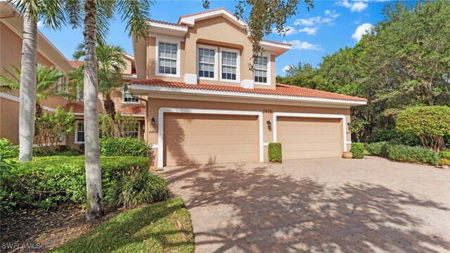 mediterranean / spanish-style house featuring a garage