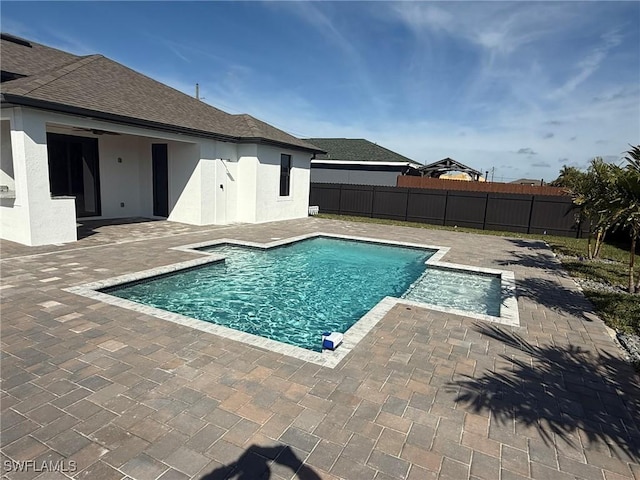 view of swimming pool featuring a patio area