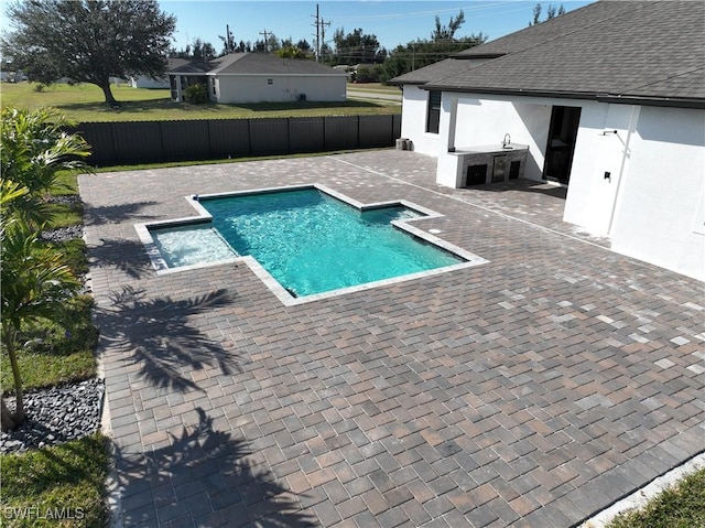 view of pool featuring a patio