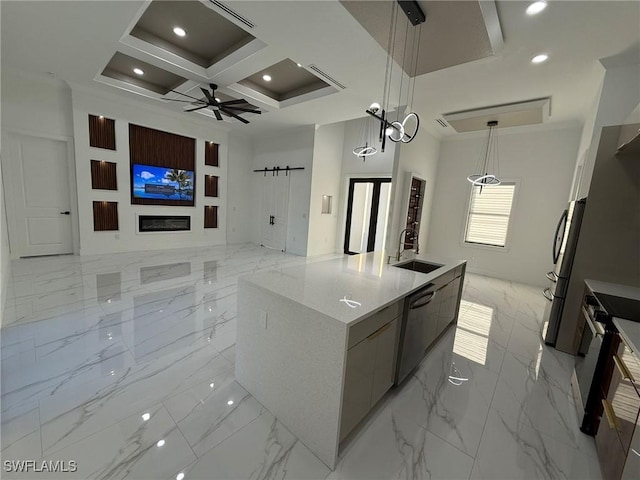 kitchen with pendant lighting, sink, a kitchen island with sink, stainless steel appliances, and coffered ceiling