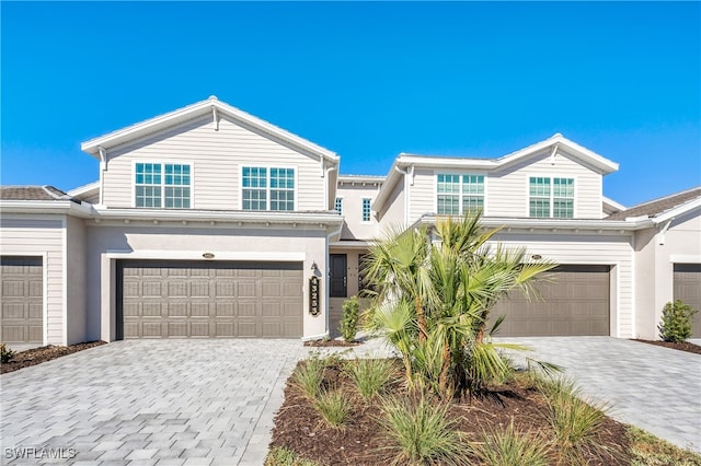 view of front of property featuring a garage